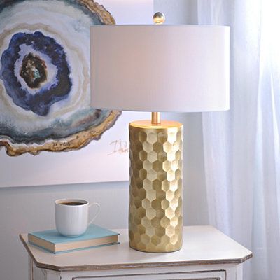 gold and white table lamp for a modern decor apartment