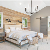 farmhouse bedroom with cupless classic candlestick chandelier