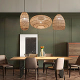 different size and shape rattan lights over dining table