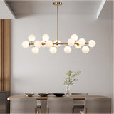 dining room with gold track light