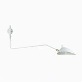 white serge mouille wall light.