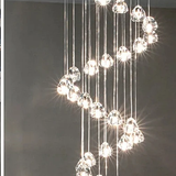 crystal ball cascade chandelier over an indoor pool
