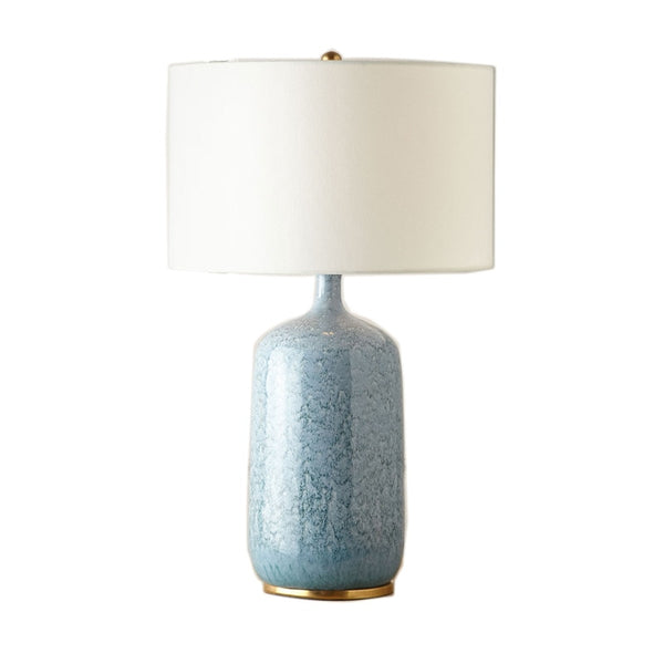Light degradated  blue ceramic lamp with white linen shade 