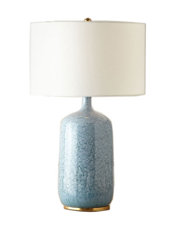 Light degradated  blue ceramic lamp with white linen shade 