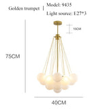balloon bouquet golden body and frosted glass chandelier