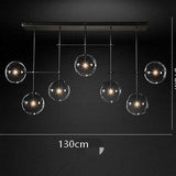 linear 7 light chandelier black and clear glass for dining table
