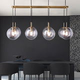 dining room with modern multiglobe chandelier
