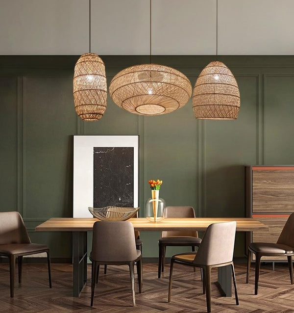 different size and shape rattan lights over dining table