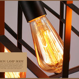 filament bulb in industrial black iron chandelier